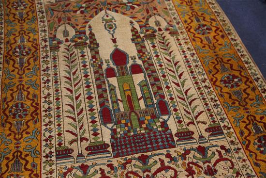 A Persian prayer rug, 6ft 6in by 4ft 2in.